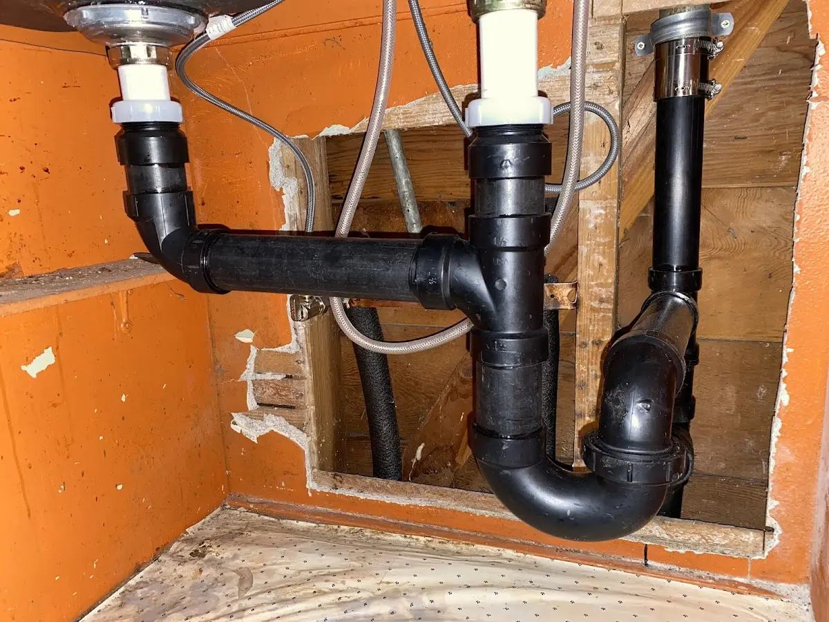 Professional Garbage Disposal Repair equipment and tools on the job in Lavon